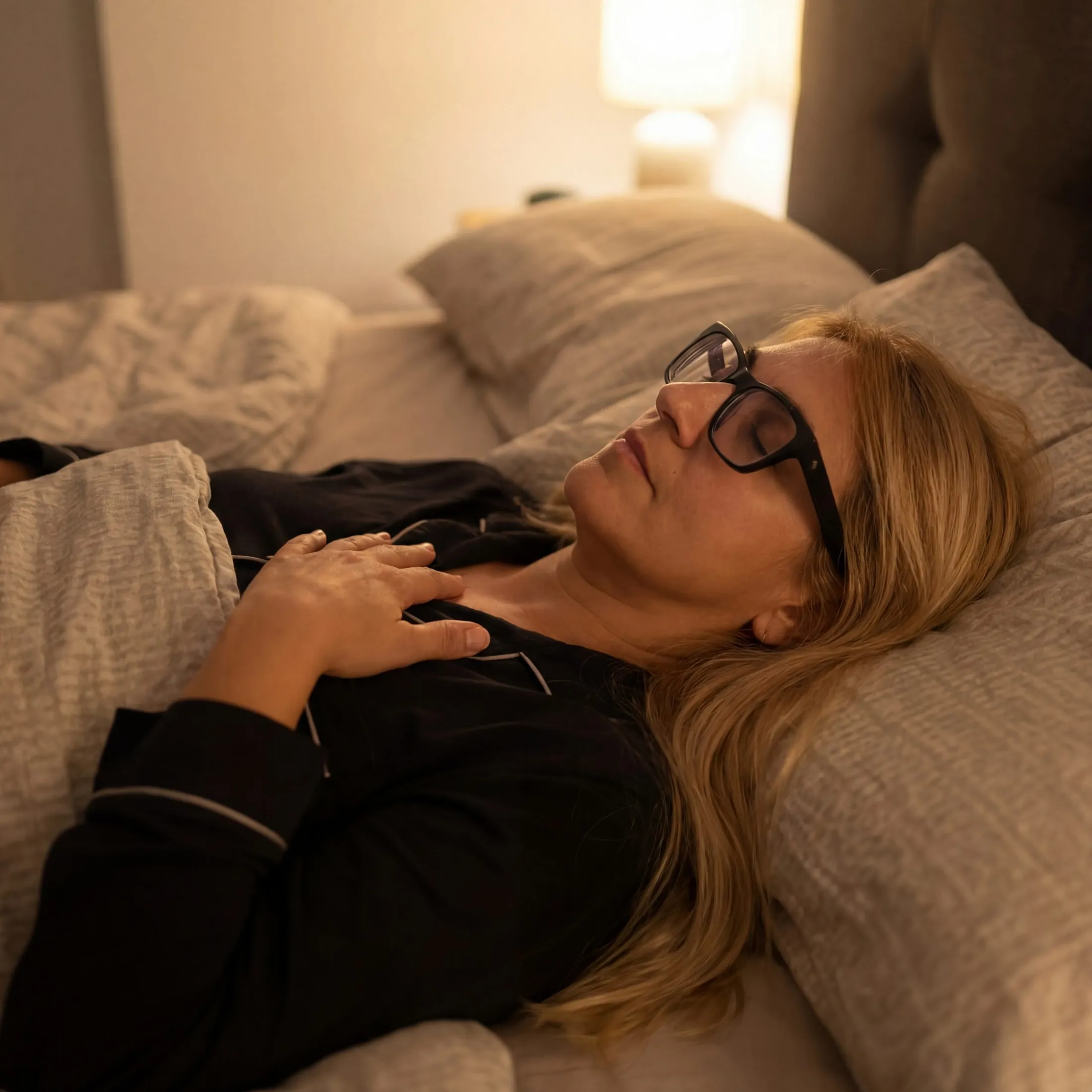 Melania resting with one hand on her heart